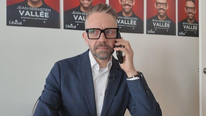 The candidate speaks on the phone.