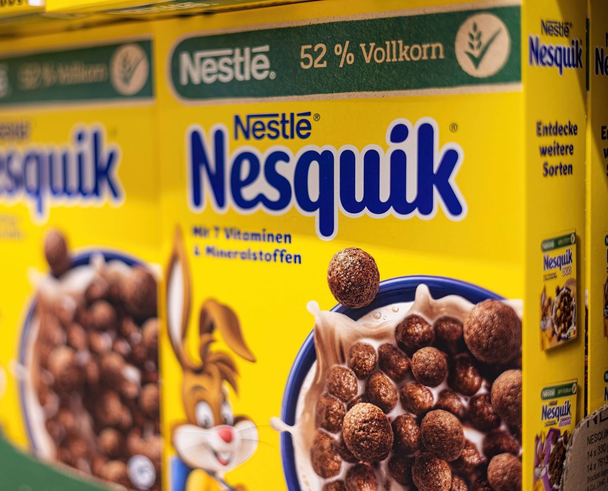 Nestle Nesquik Cerealia box with cartoon mascot in a shelf in Frankfurt, Germany on March 21, 2025, highlighted with 52% whole grain. Nestle Nesquik Cerealia box with cartoon mascot in a shelf in Frankfurt, Germany on March 21, 2025, highlighted with 52% whole grain.