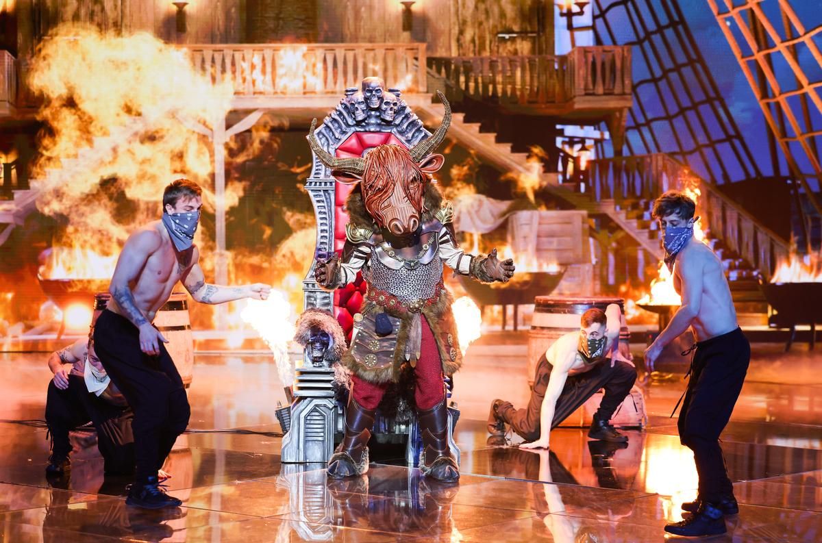 The bison surrounded by dancers in a spectacular staging.