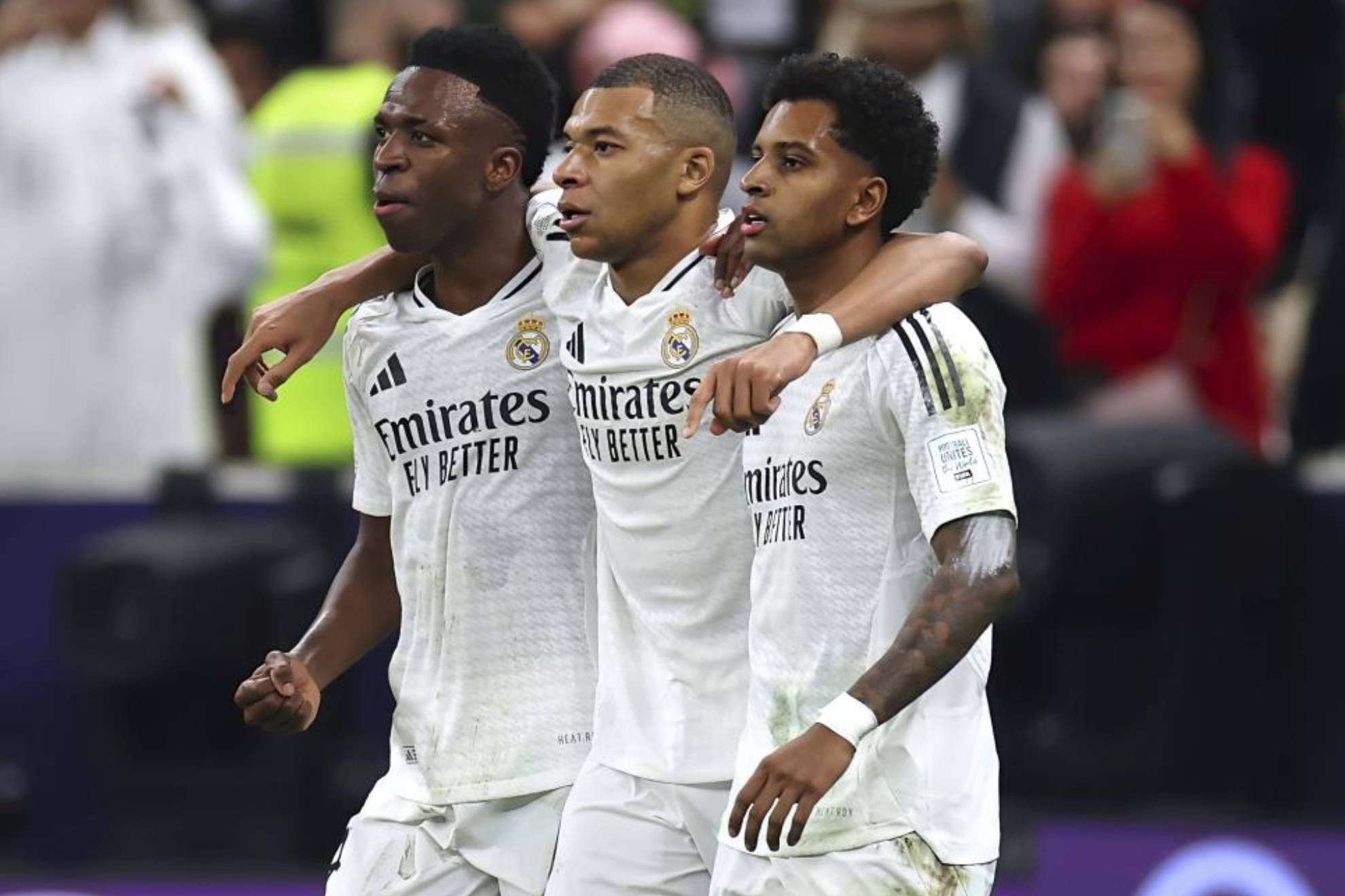 Mbappé celebrates a goal with Rodrygo and Vinicius in the final of the Intercontinental.