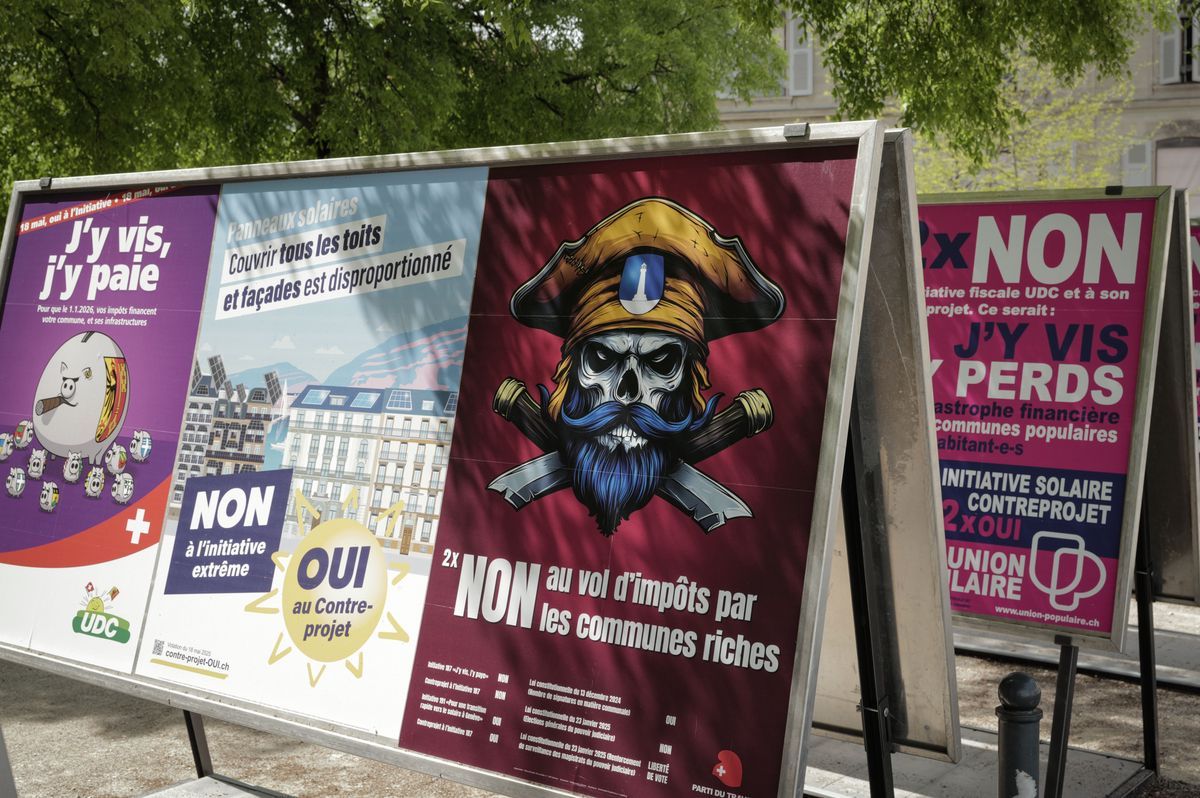 Voting posters in Geneva in April 2025, including campaigns for a transition to solar and the Popular Initiative 187 Voting posters in Geneva in April 2025, including campaigns for a transition to solar and the Popular Initiative 187
