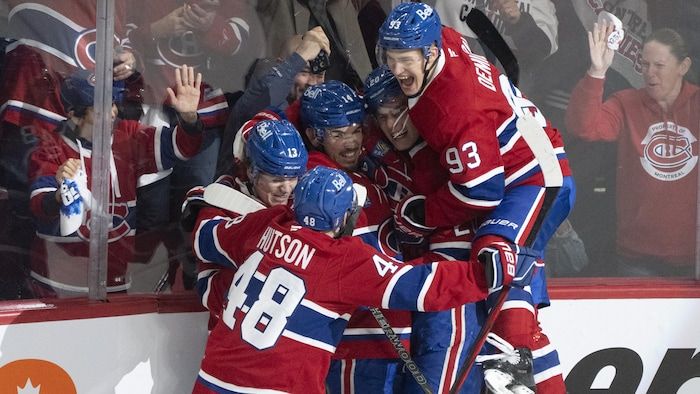 Canadian players are joyful.