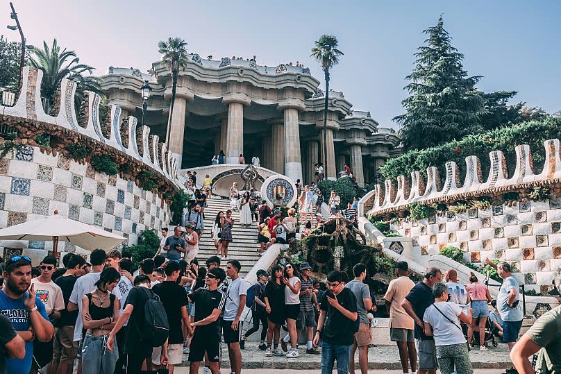 The crowd gathers at Guell Park.