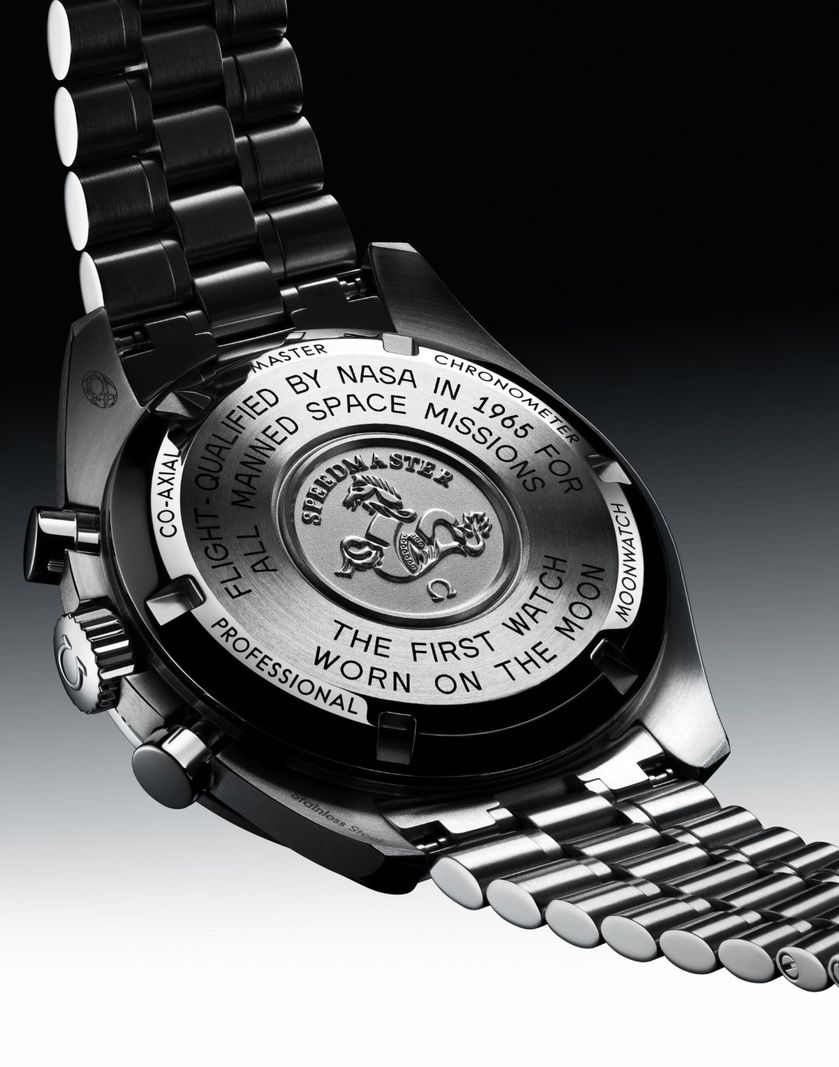 Back to a watch with engraving indicating 'The first watch carried on the Moon', symbol of a hippocampus and mention of space missions approved by NASA. Back to a watch with engraving indicating 'The first watch carried on the Moon', symbol of a hippocampus and mention of space missions approved by NASA.