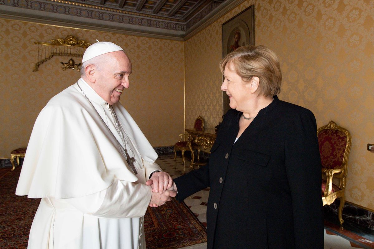Pope Francis shakes the hand of the German Chancellor Angela Merkel during a private hearing at the Vatican on October 7, 2021. Pope Francis shakes the hand of the German Chancellor Angela Merkel during a private hearing at the Vatican on October 7, 2021.