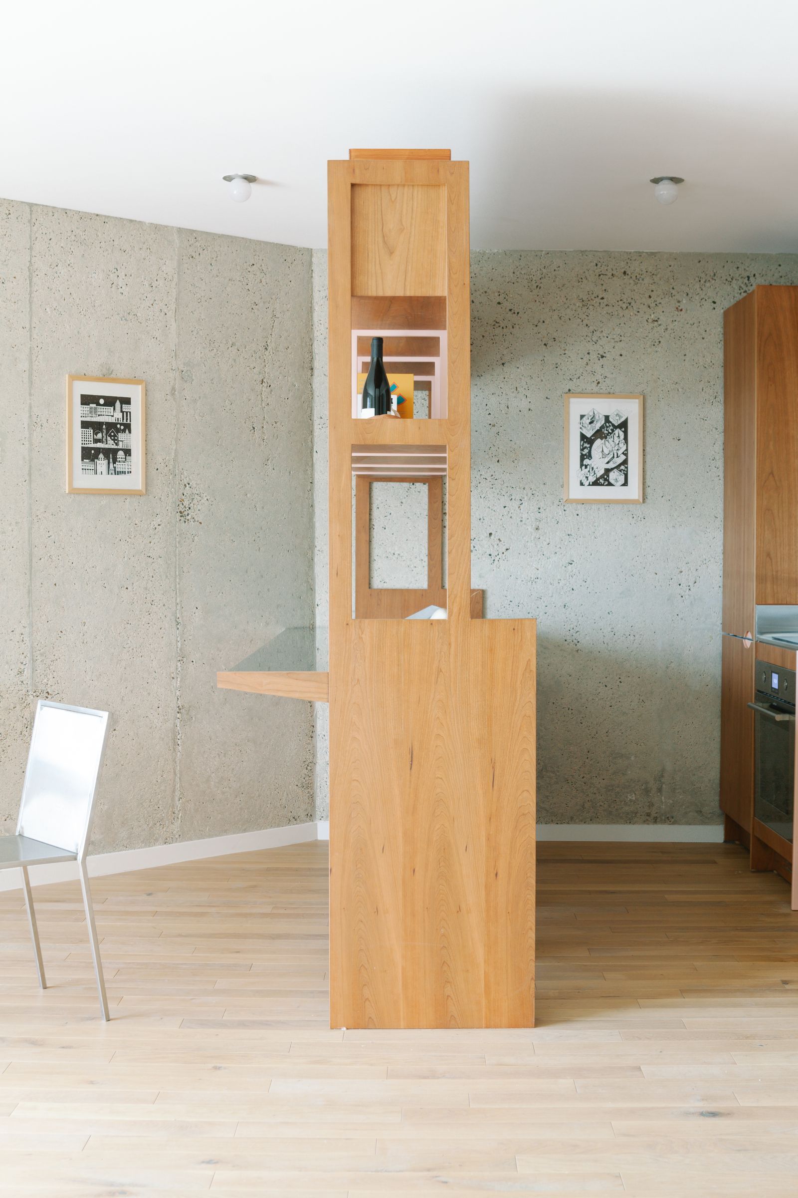 The kitchen and on the left a chair of jerome chauvign.