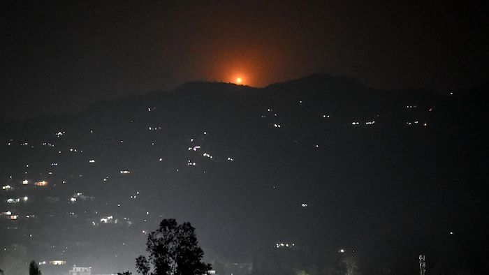 A rocket lighting up the sky above the district of Poonch, India, on May 7, 2025.