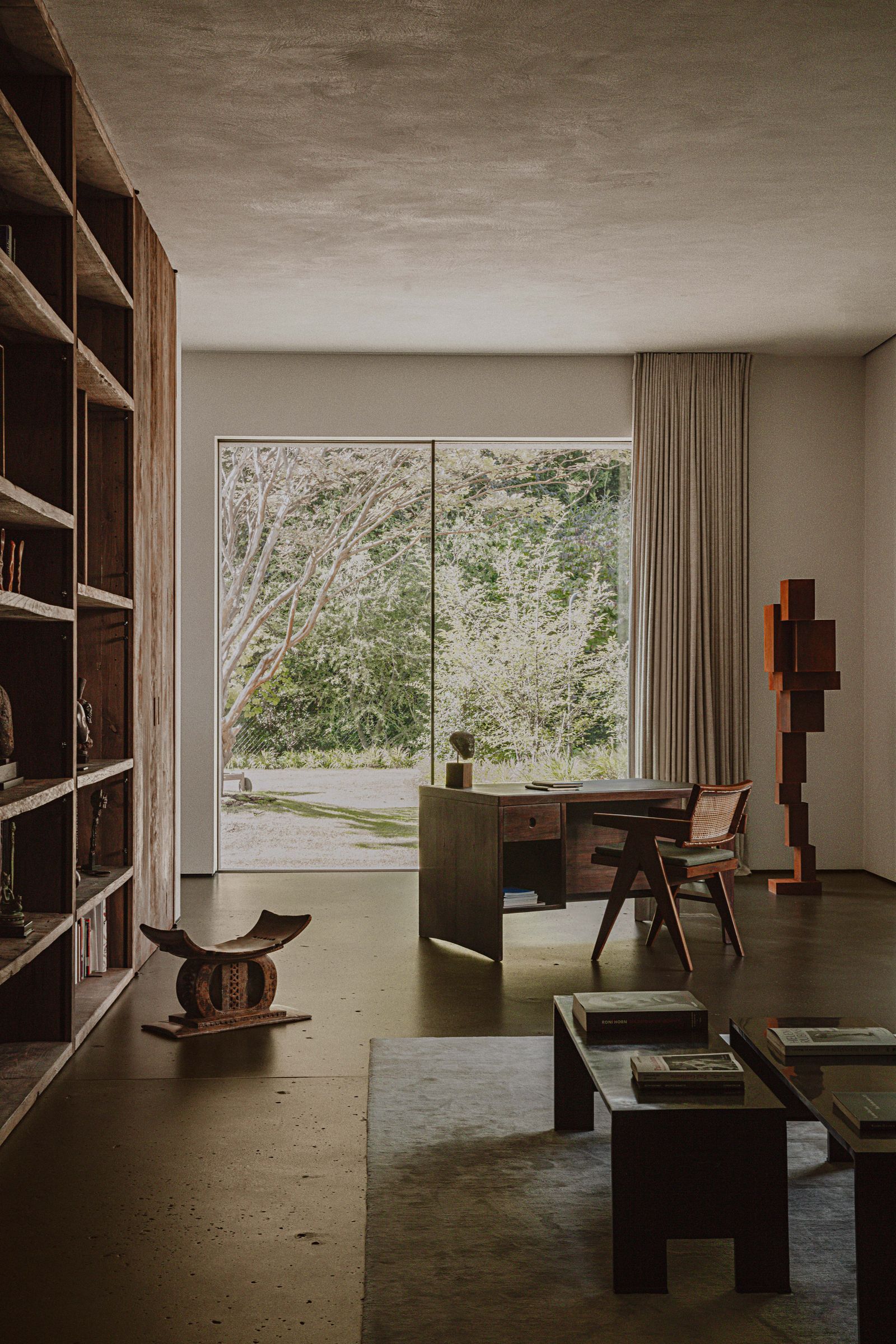 works of art and design in an office with a window bay