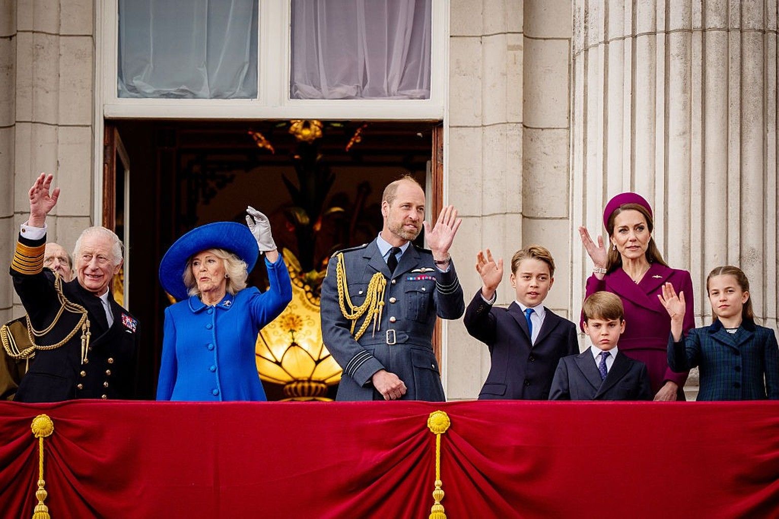 LONDON, ENGLAND - MAY 5: (left to right) King Charles III, Queen Camilla, the Prince of Wales, Prince George, the Princess of Wales, Prince Louis and Princess Charlotte on the balcony of Buckingham Pa ...