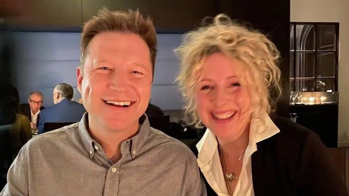 Jenifer Darbellay, on the right, is photographed with her husband, Noel Johansen.