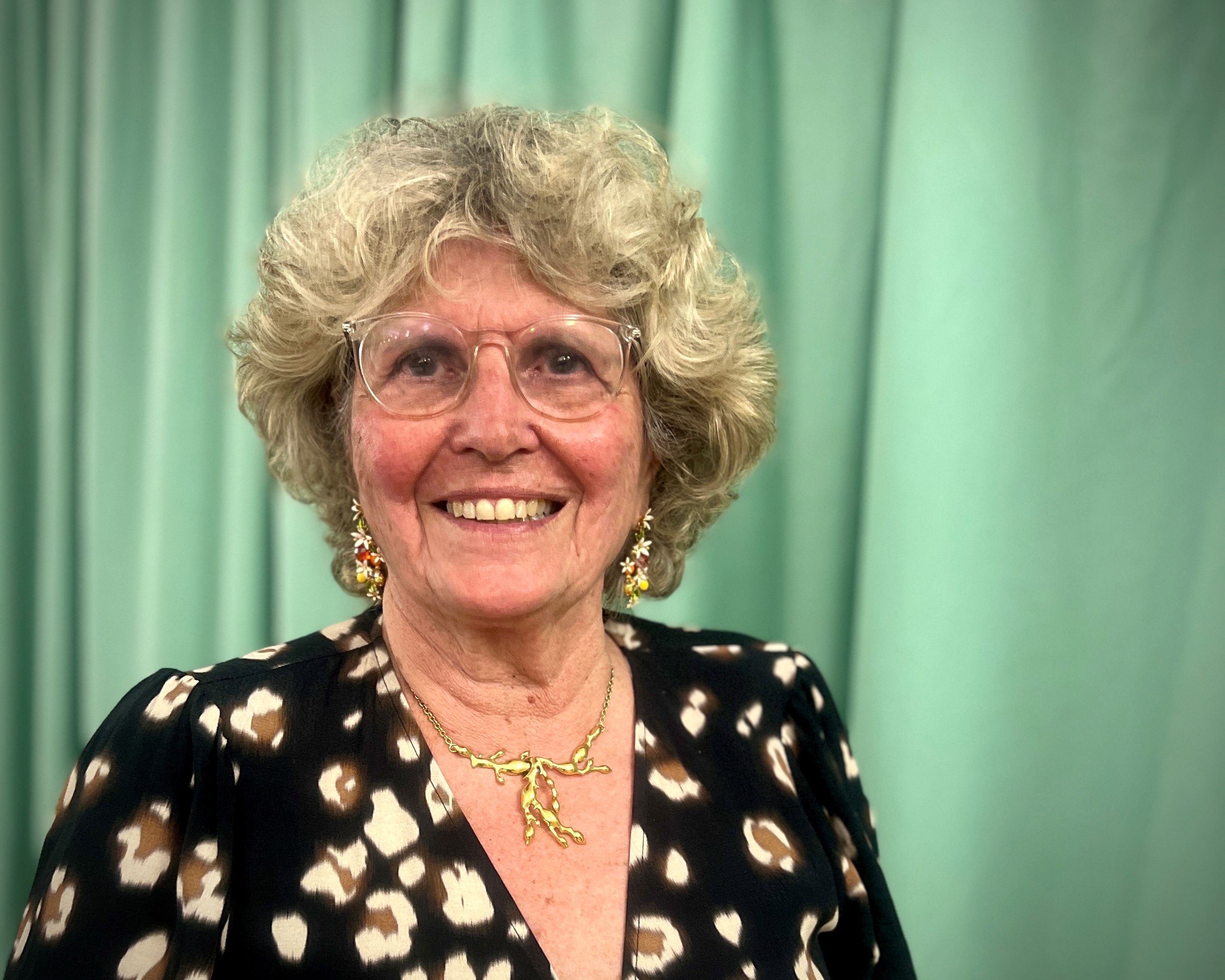 an 80 -year -old woman with glasses