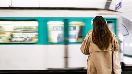 A woman is waiting for the metro in Paris. Illustration image. (Julie Sebadelha / AFP)