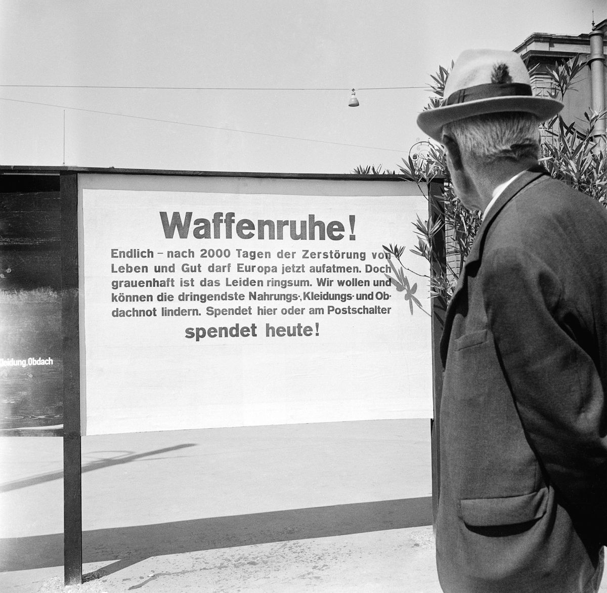 On May 8, 1945, a man in Zurich looked at a poster that calls for the 'Swiss donation' for war -like. On May 8, 1945, a man in Zurich looked at a poster that calls for the 'Swiss donation' for war -like.