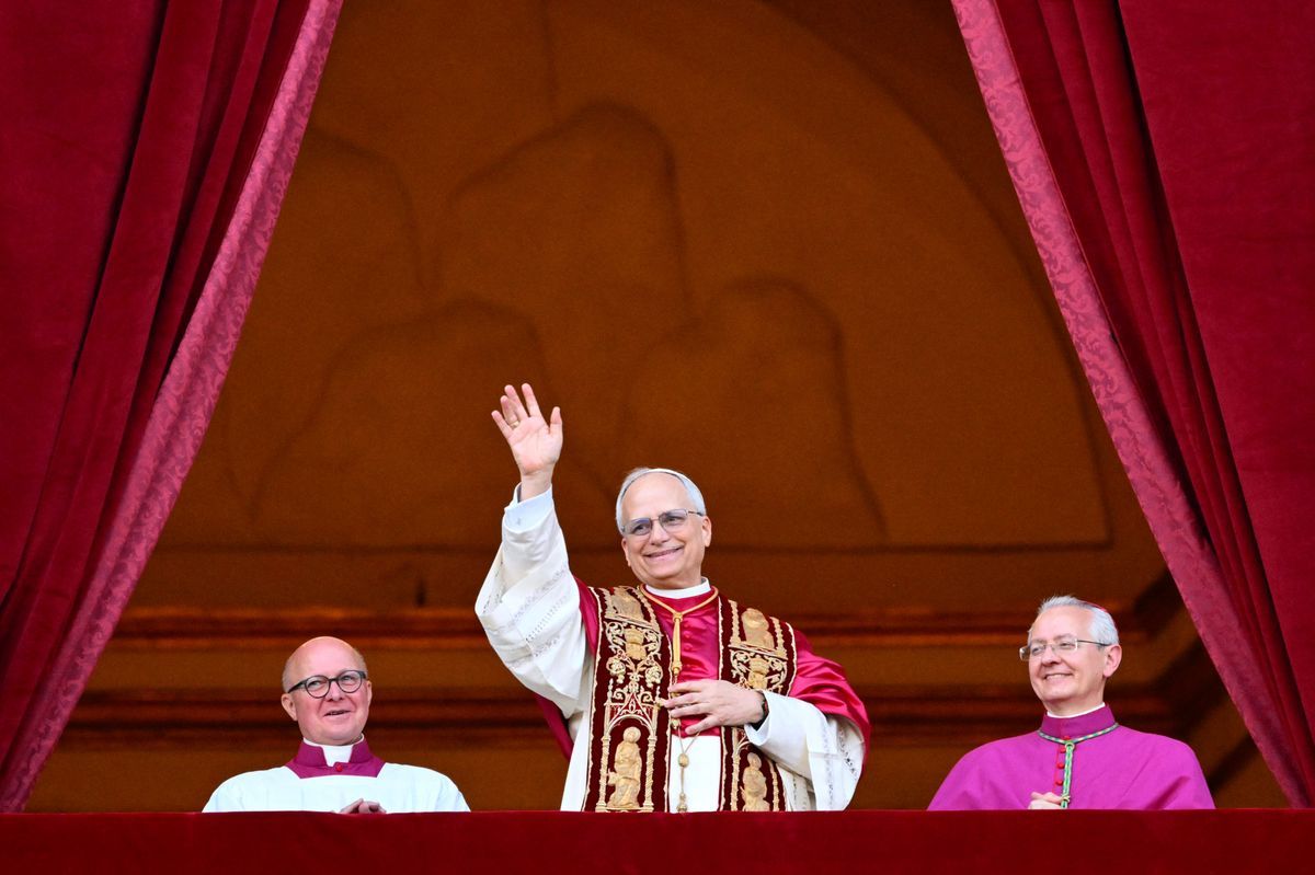 The new Pope Leo XIV, Robert Prevost, appears at the central balcony of the Saint-Pierre basilica in the Vatican, greeting for the first time after his election, on May 8, 2025. The new Pope Leo XIV, Robert Prevost, appears at the central balcony of the Saint-Pierre basilica in the Vatican, greeting for the first time after his election, on May 8, 2025.
