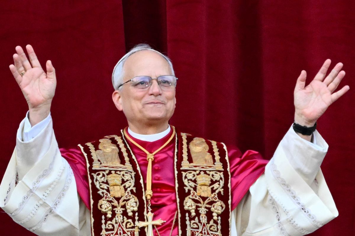 Pope Leo XIV, newly elected, Robert Prevost on the Balcony of the Central Loggia of the Saint-Pierre Basilica in the Vatican, on May 8, 2025, raising the hands to greet the crowd after the end of the conclave. Pope Leo XIV, newly elected, Robert Prevost on the Balcony of the Central Loggia of the Saint-Pierre Basilica in the Vatican, on May 8, 2025, raising the hands to greet the crowd after the end of the conclave.