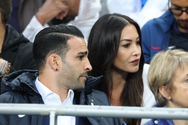 Adil Rami and Sidonie Biémont during the quarter-final match of UEFA Euro 2016 France-Island at the Stade de France in Saint-Denis, July 3, 2016.