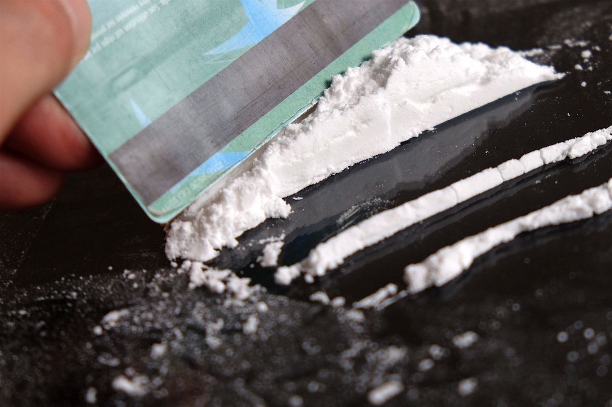 Illegal drugs with lines of white powder and map, illustrating drug addiction in Luxembourg. Photo by Fabrizio Pizzolente. Illegal drugs with lines of white powder and map, illustrating drug addiction in Luxembourg. Photo by Fabrizio Pizzolente.