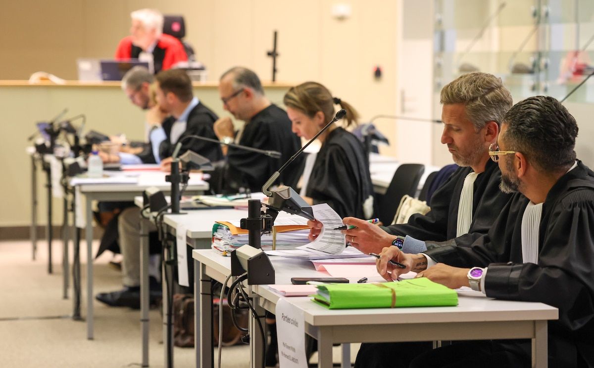 Lawyers Florent Pivin and Ahmed El Abouti pictured during the start of the trial of Micha¿l Pindeville and a second individual, a minor at the time of the events, for torture resulting in death as part of a drug-related settlement, in the Brussels-Capital Assizes Court in Brussels, Monday 05 May 2025. The two men are accused of torturing a man in his thirties, Yacine, to the point of killing him, in March 2022 in the Marolles district of Brussels. Yacine was a