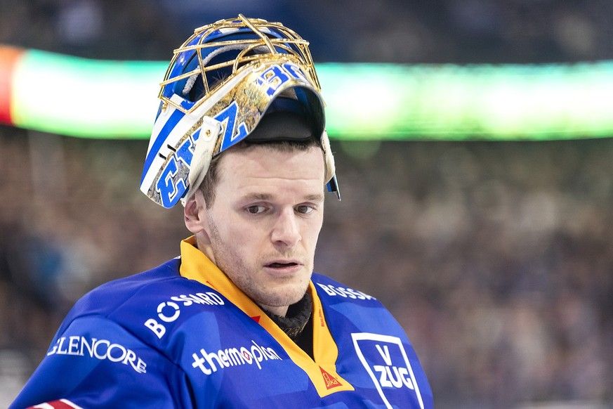 Torhueter Leonardo Genoni (EVZ) In the game of the Ice Hockey National League between the EV Zug, EVZ, and Friborg-Gotteron on Monday, December 23, 2024 in the Bossard Arena in Zug. (Keystone/Alexandra Wey ...