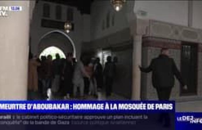 A tribute paid to the Paris mosque this morning, its burial planned in Mali
