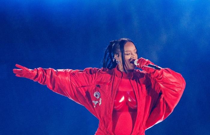 Rihanna unveils a surprise baby bump on the way to the Met Gala