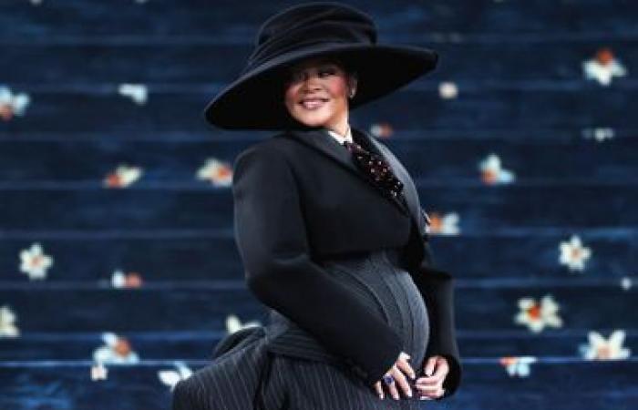 She reveals her round belly at Met Gala