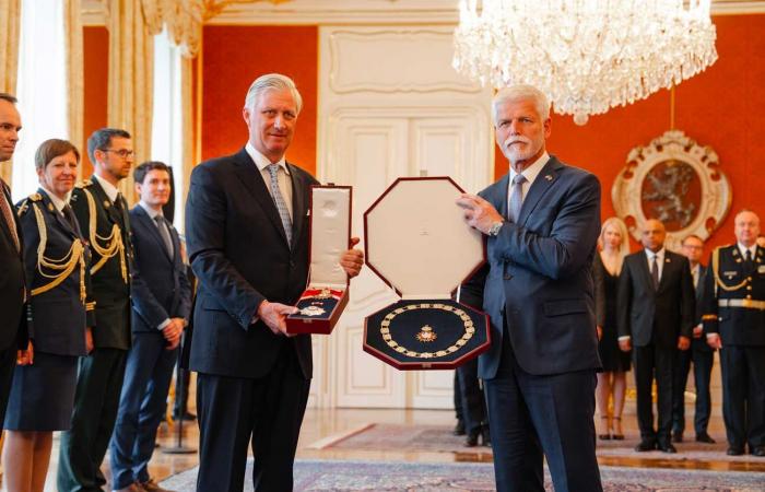 King Philippe receives the necklace from the Order of the White Lion of the President of the Czech Republic