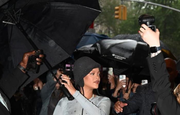 Rihanna unveils a surprise baby bump on the way to the Met Gala