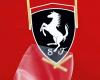 Look at the Ferrari logo being painted by hand, it is hypnotizing (and dear)