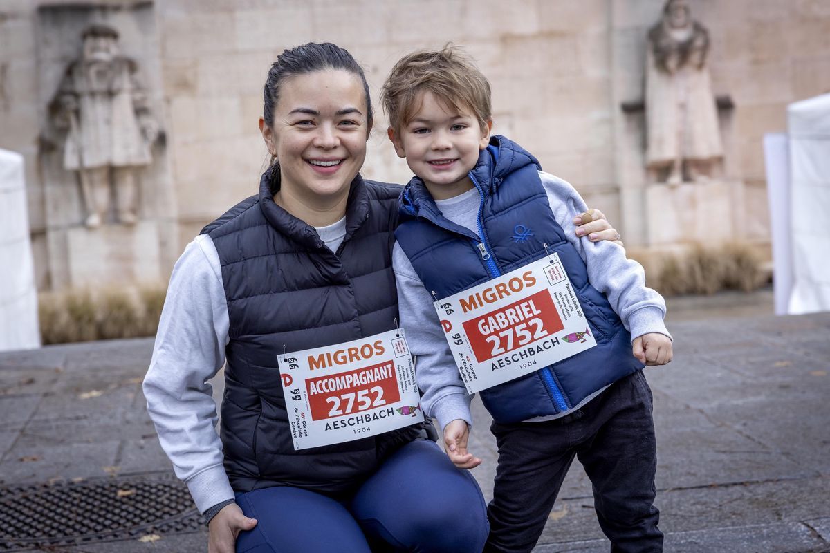 Geneva, December 8, 2024. Atmosphere during the 46th edition of the Course de l Escalade. Parent-Child Category. © Magali Girardin