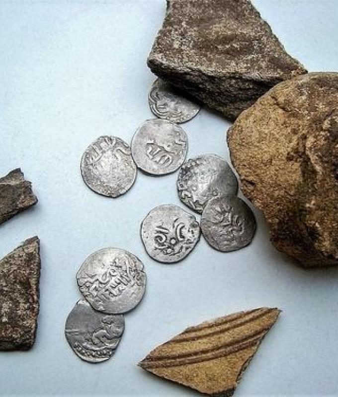 While renovating their kitchen floor, they discovered real gold coins over 600 years old