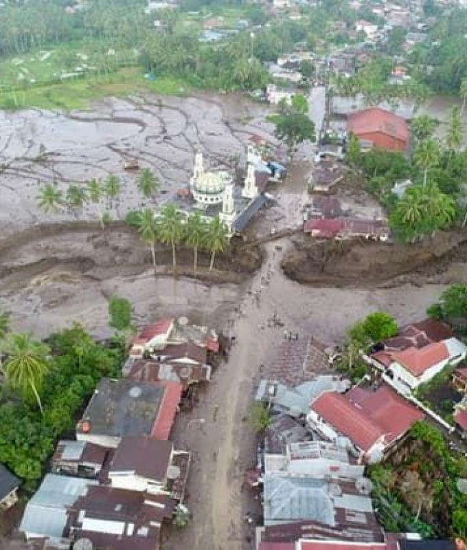 floods and cold lava flows kill at least 34 people