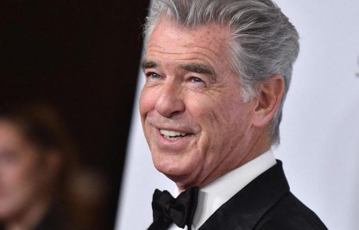 Pierce Brosnan appears in rare photo surrounded by his two sons