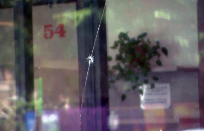 “It’s traumatic”: bullet holes in the window of a Mile-End business