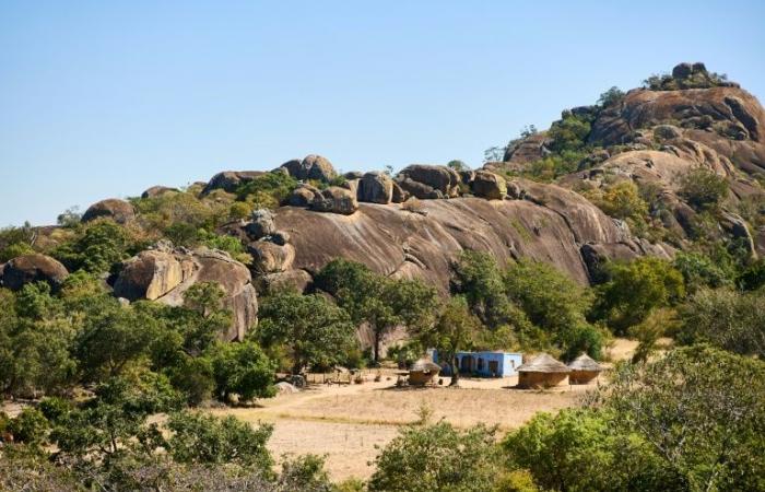 In Zimbabwe, climbing a hill to make a phone call