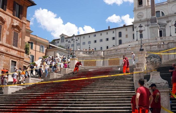 Feminists cover the Spanish Steps in Rome with fake blood