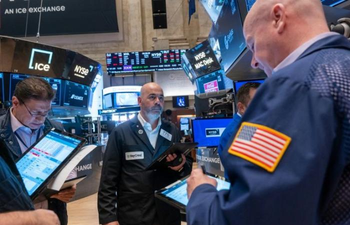 Wall Street closes down but reports strong first half of 2024