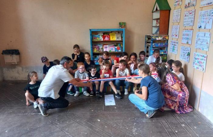 Schoolchildren created a book box in the village center