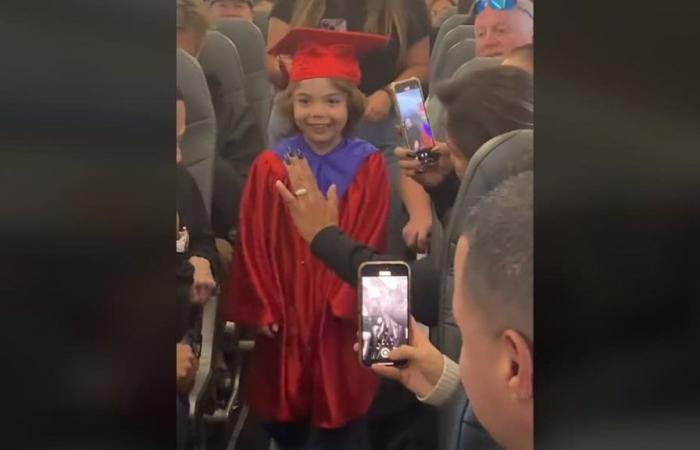 Flight passengers hold graduation for 5-year-old who missed school
