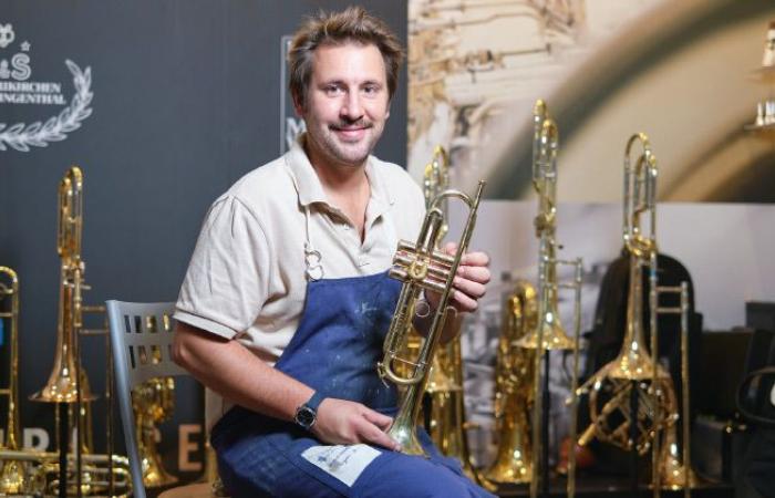 What is the background of Adrien Jaminet, the only French luthier specializing in brass instruments?