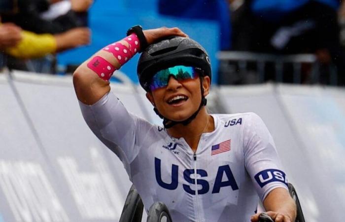 Oksana
      Masters
      wins
      second
      cycling
      title