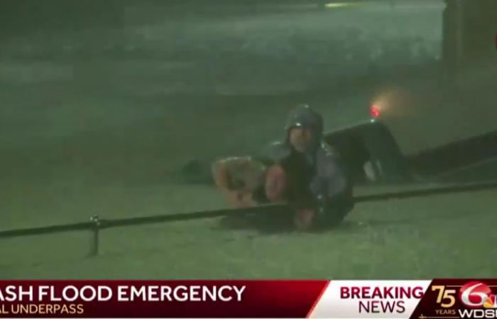 Driver
      saved
      from
      drowning
      in
      Louisiana,
      live
      on
      TV