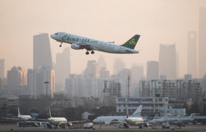 All
      flights
      cancelled
      in
      Shanghai
      ahead
      of
      Typhoon
      Bebinca