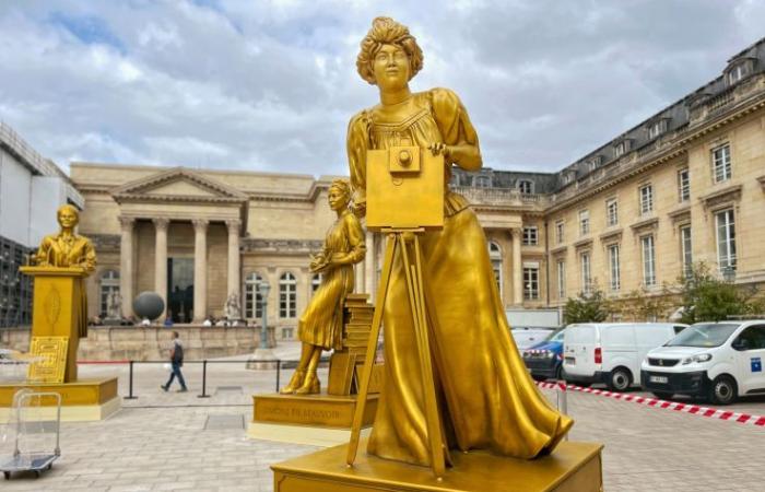 Statues of the 10 golden women from the opening ceremony on display at the National Assembly