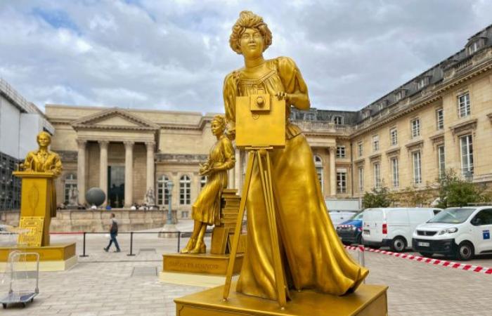 Statues of the 10 golden women from the opening ceremony on display at the National Assembly