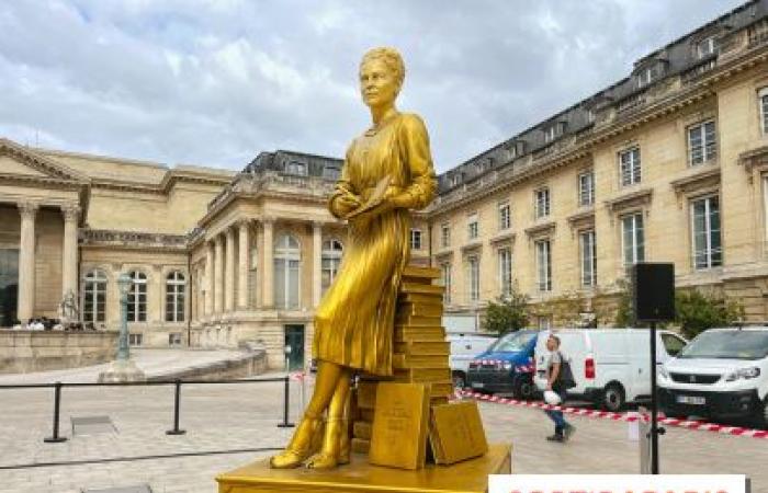 Statues of the 10 golden women from the opening ceremony on display at the National Assembly