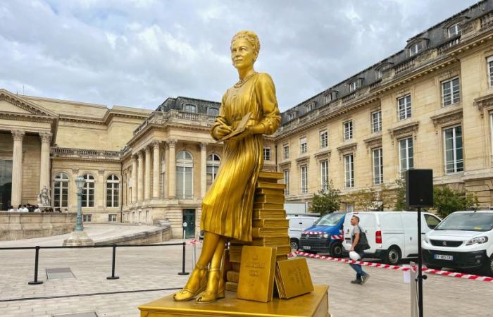 Statues of the 10 golden women from the opening ceremony on display at the National Assembly