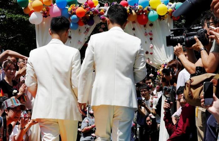 Taiwan opens way for cross-border same-sex marriages with China