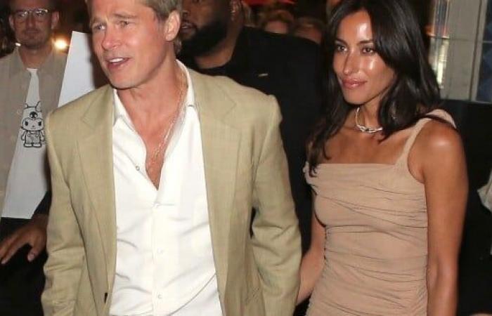 Brad Pitt and his young girlfriend Ines de Ramon in a dress very close to her ultra tanned body