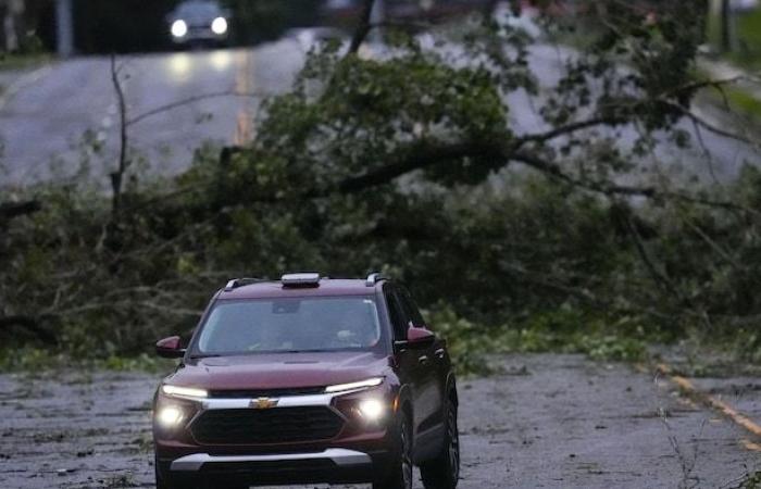 Helene is downgraded to a tropical storm after causing more than 33 deaths